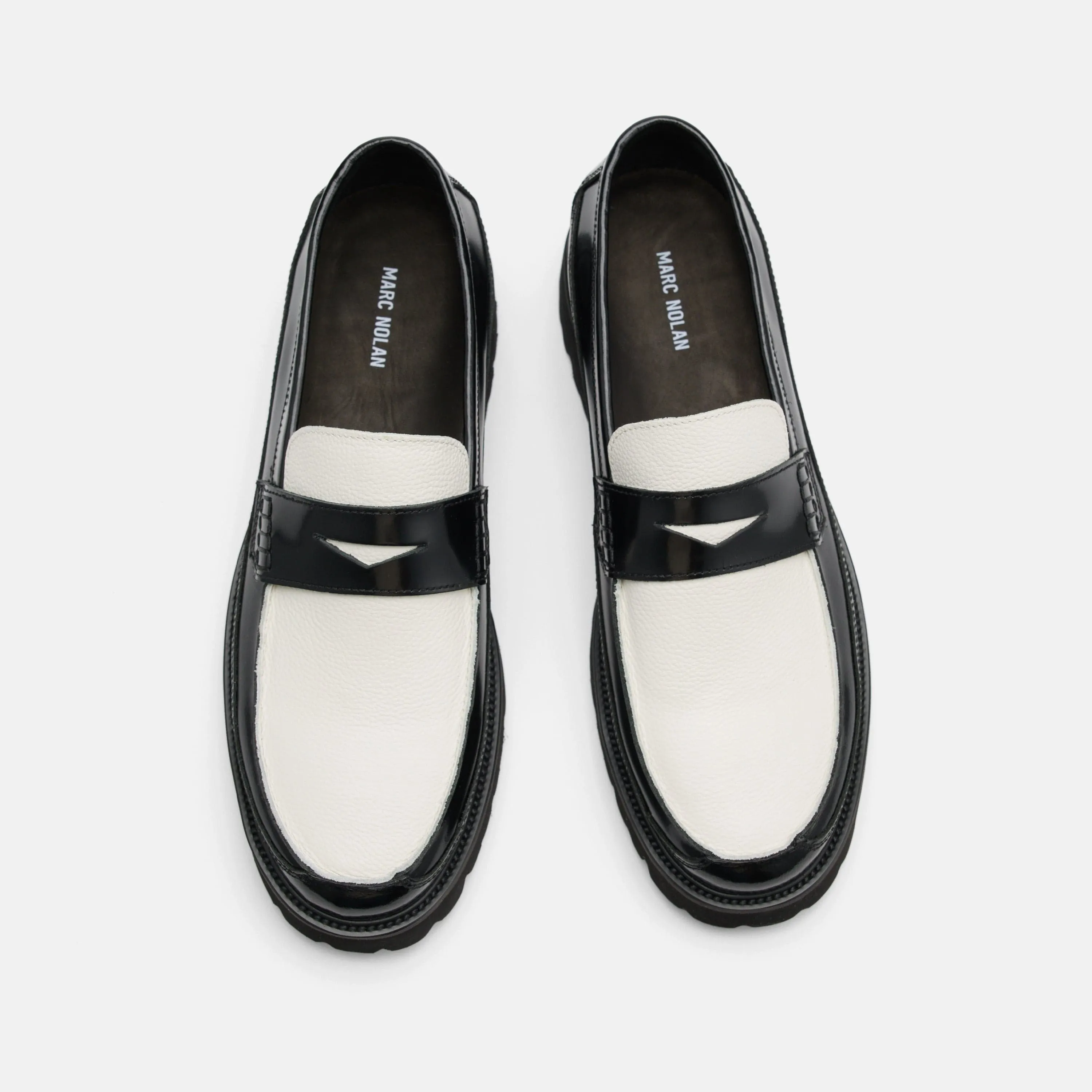 Mocassins Penny Adler en cuir noir et blanc