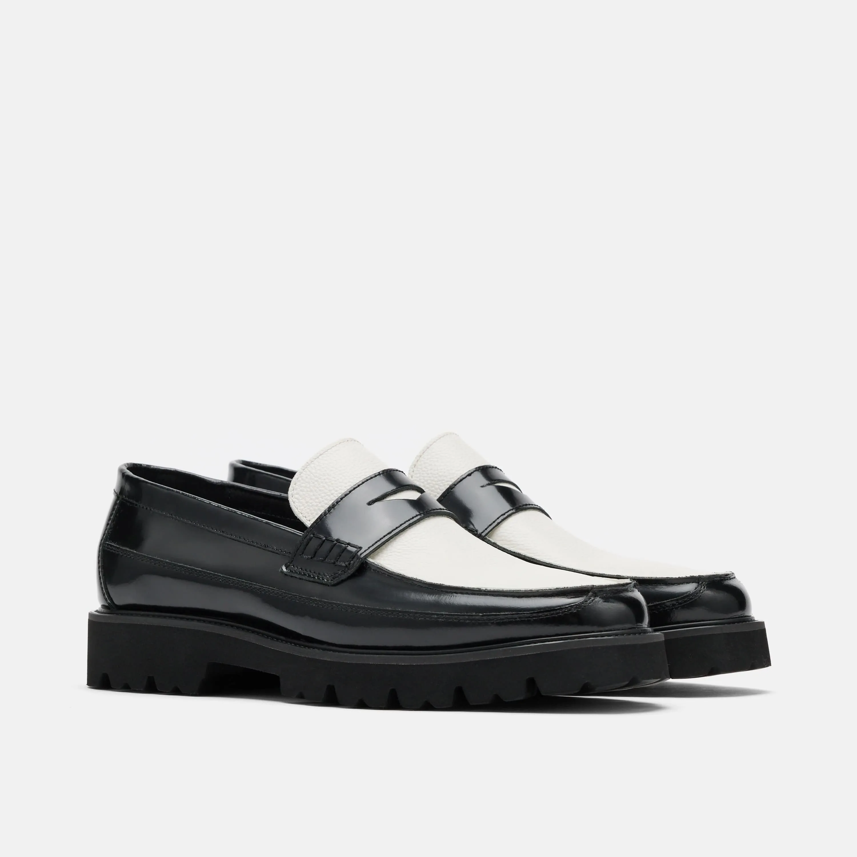 Mocassins Penny Adler en cuir noir et blanc