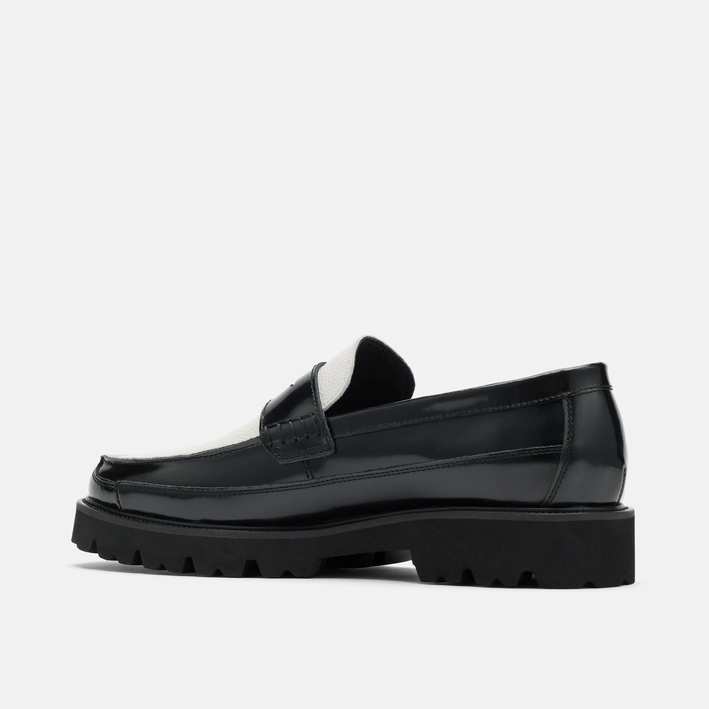 Mocassins Penny Adler en cuir noir et blanc
