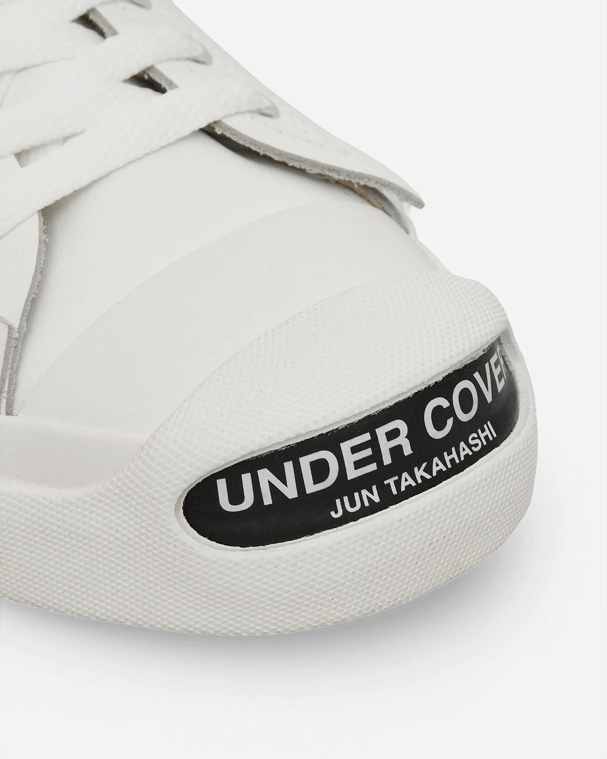 Baskets en cuir blanc avec logo sur l'orteil pour homme